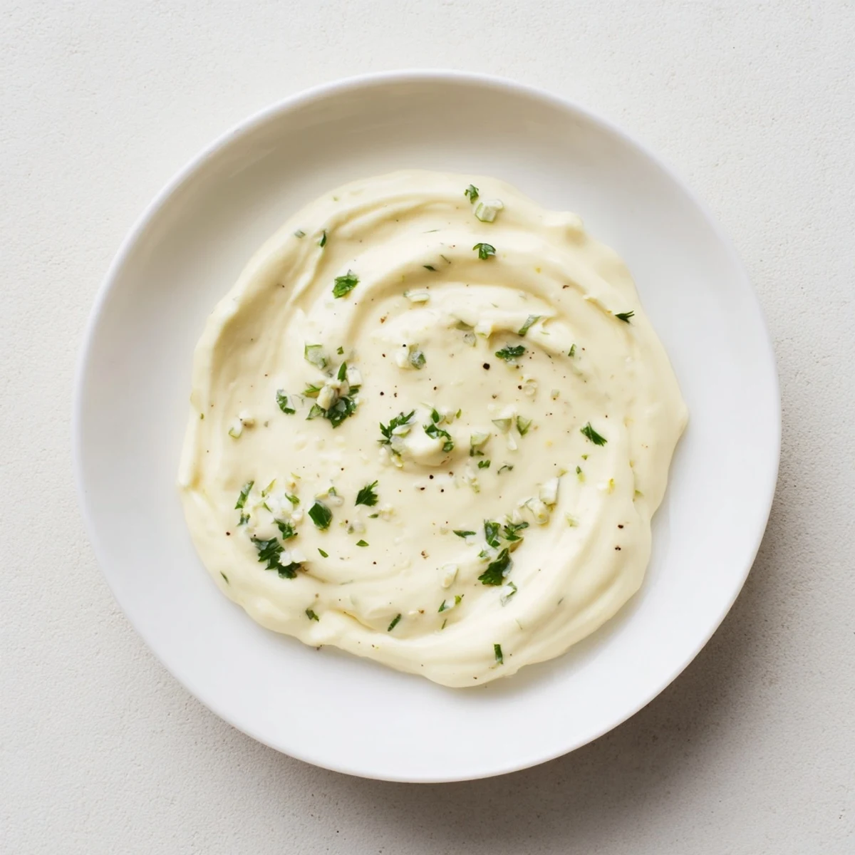 This flavorful garlic mayo boasts a rich, smooth texture, perfect for fries and sandwiches alike.