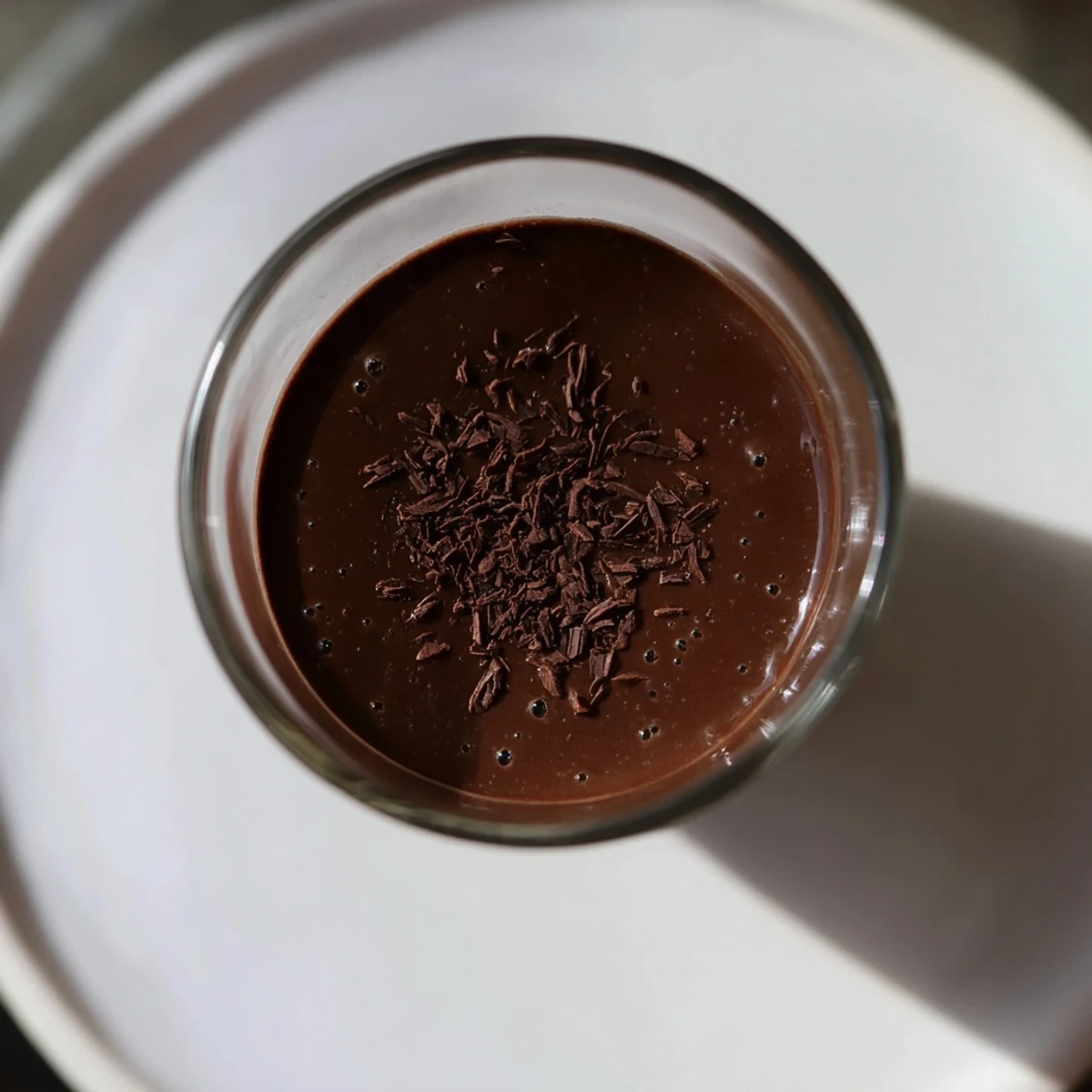 A close-up shot of rich and decadent shot chocolate, perfect for a special treat.