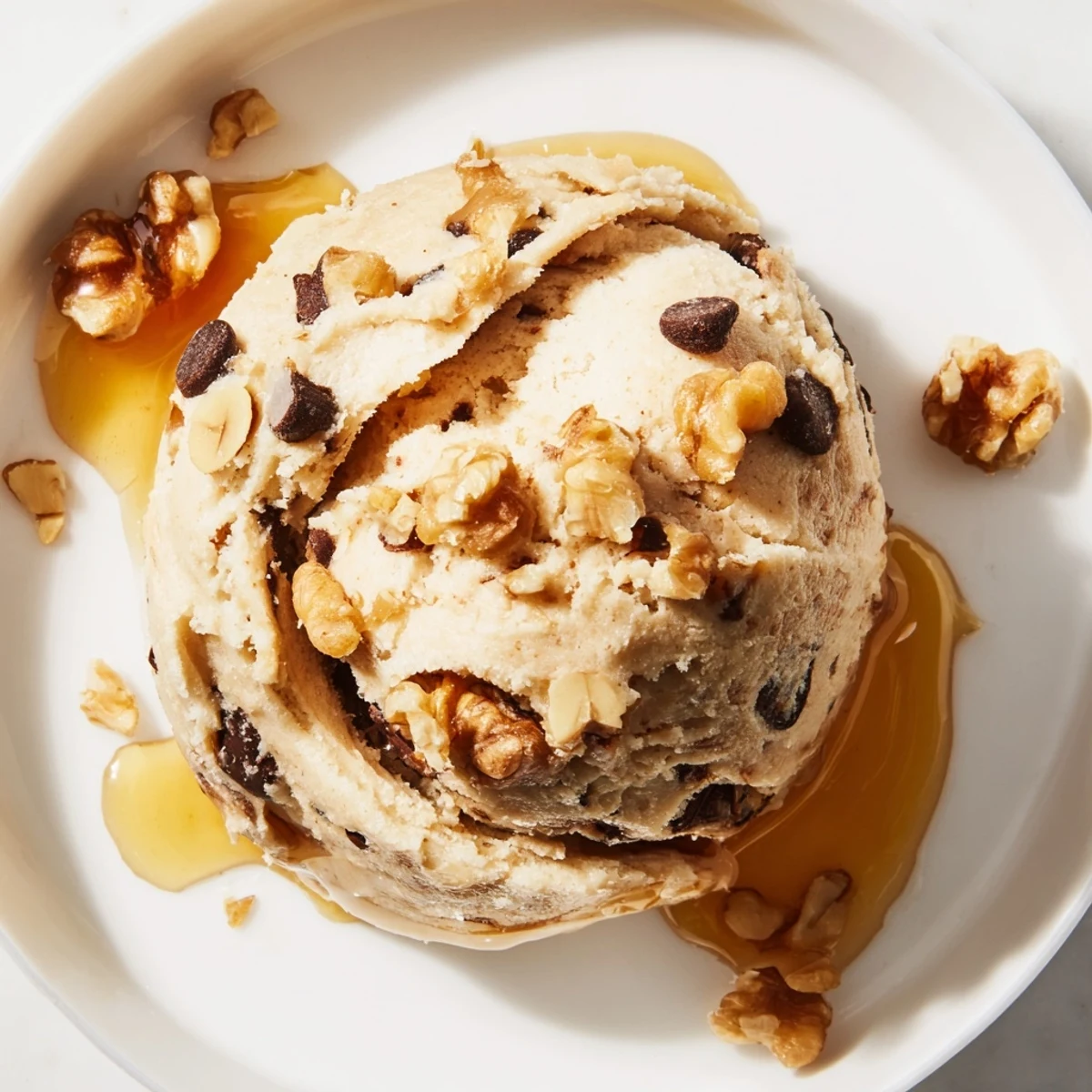 Guilt Free Greek Yogurt Cookie Dough shown as a creamy dip with a spoon, surrounded by fresh apple slices.