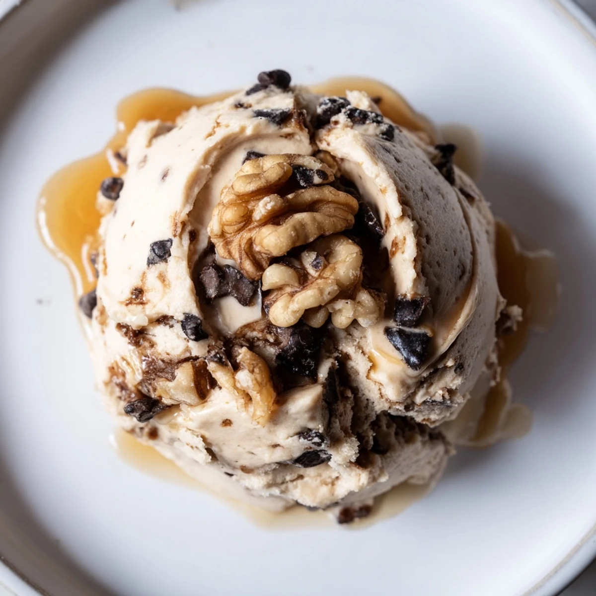 This image captures Guilt Free Greek Yogurt Cookie Dough scooped into a rustic bowl with honey drizzle.