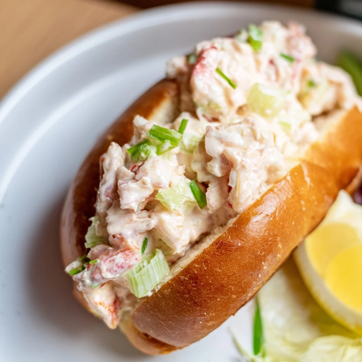Luxurious garlic butter lobster rolls featuring creamy lobster salad inside warm butter toasted brioche rolls