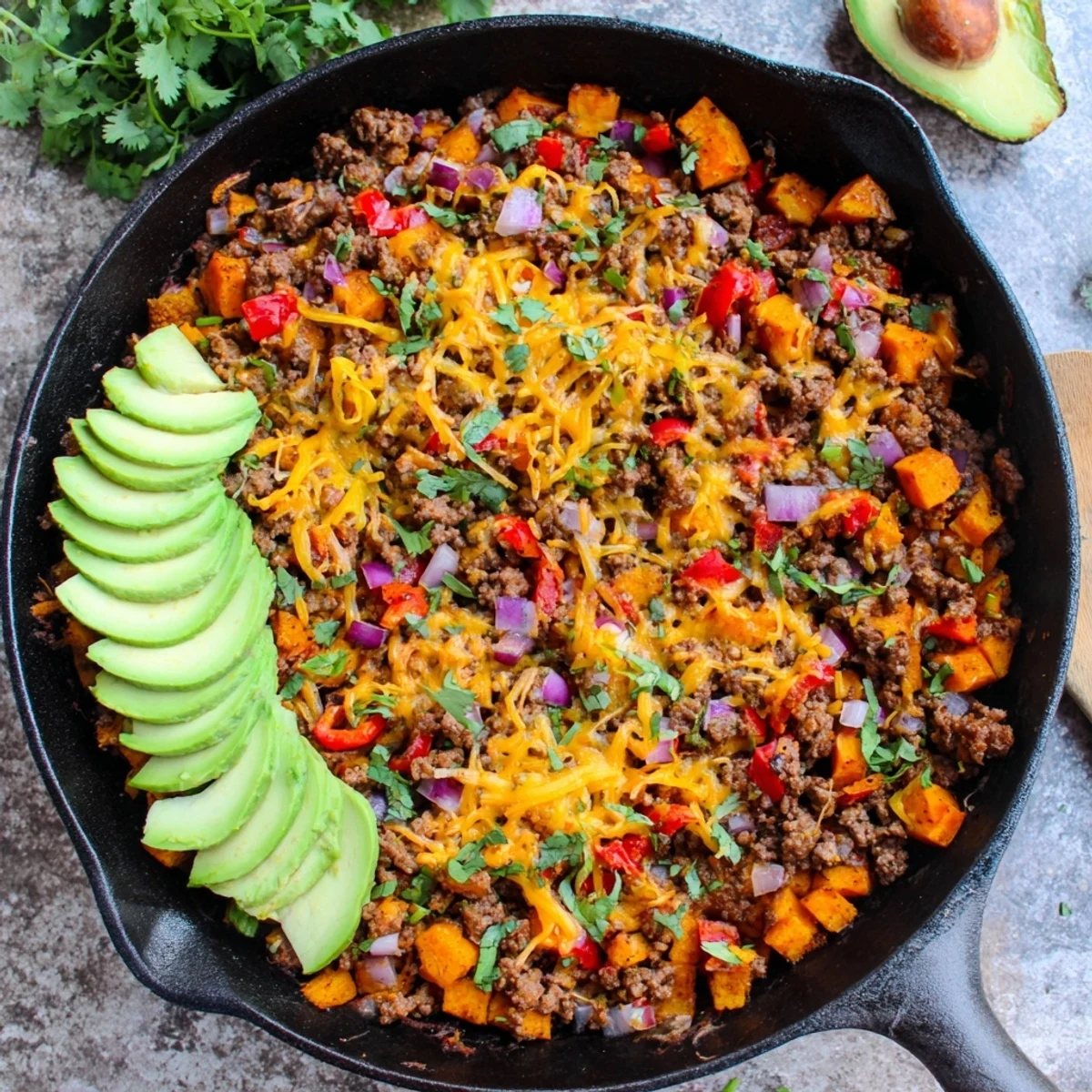 Sizzling Southwest ground beef and sweet potato skillet featuring tender vegetables and bold seasonings