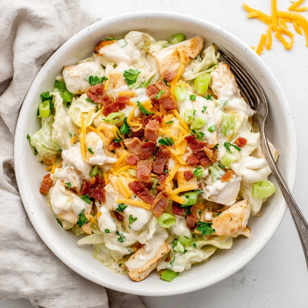 Tender chicken and crispy bacon tossed in creamy ranch sauce with sautéed cabbage