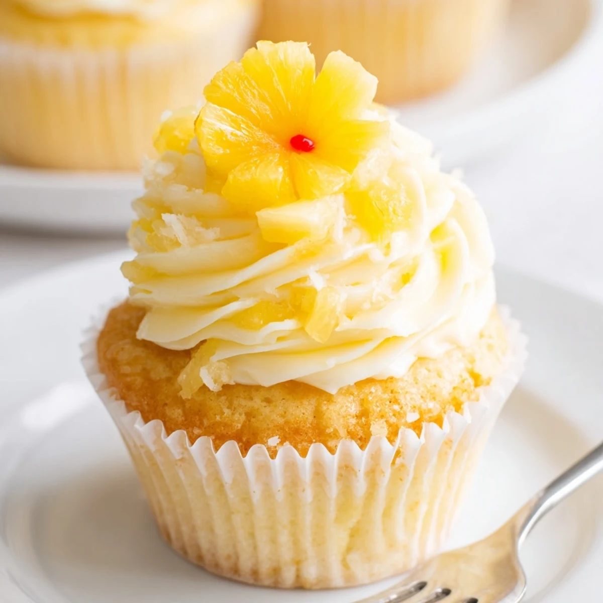 Warm Dole Whip Cupcakes Recipe served on wire rack, tart pineapple aroma