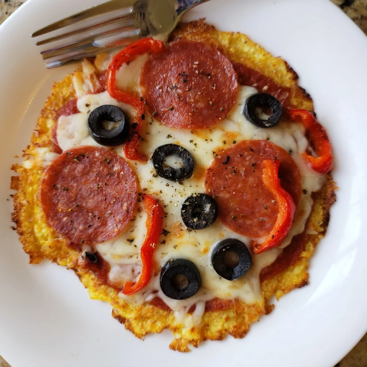 Freshly baked Keto Pizza With Crispy Low Carb Crust served hot with salad