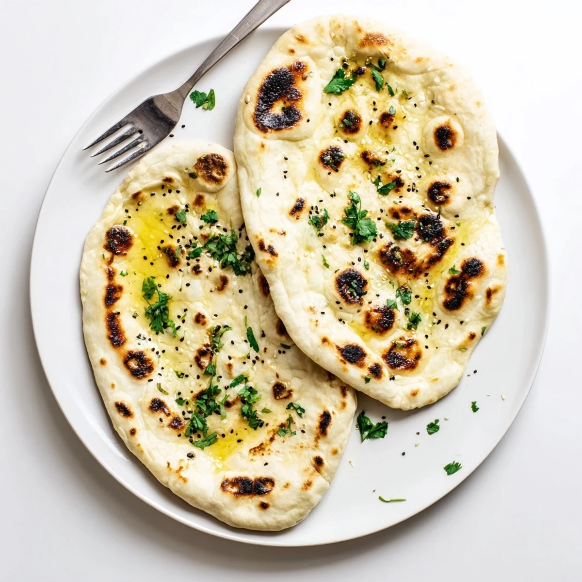 Pillowy Indian-style flatbread made with sourdough discard, perfect for scooping savory curries